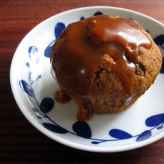 A picture of Sticky Date Cupcakes with Caramel Sauce.