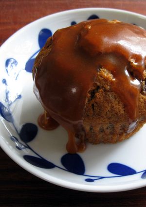 A picture of Sticky Date Cupcakes with Caramel Sauce.
