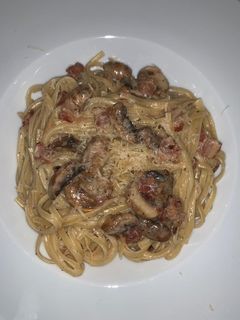 Una foto de Pasta con hongos, bacon y trufas