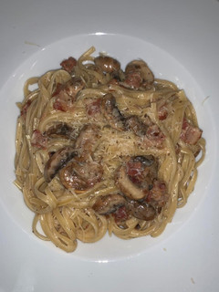 Una foto de Pasta con hongos, bacon y trufas