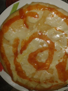 Una foto de Pizza de queso