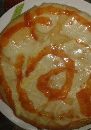Una foto de Pizza de queso