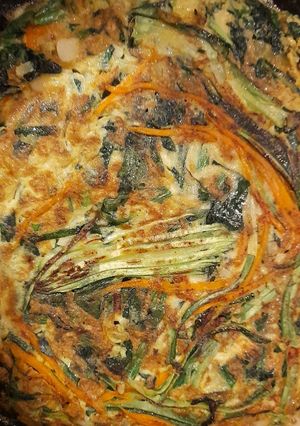 Una foto de Tortilla simple de espinaca y zapallo italiano