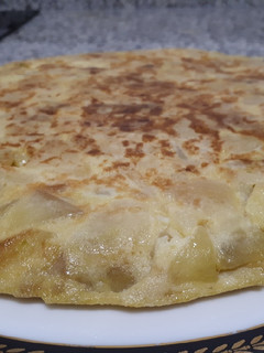 Una foto de Tortilla de patatas y calabacín