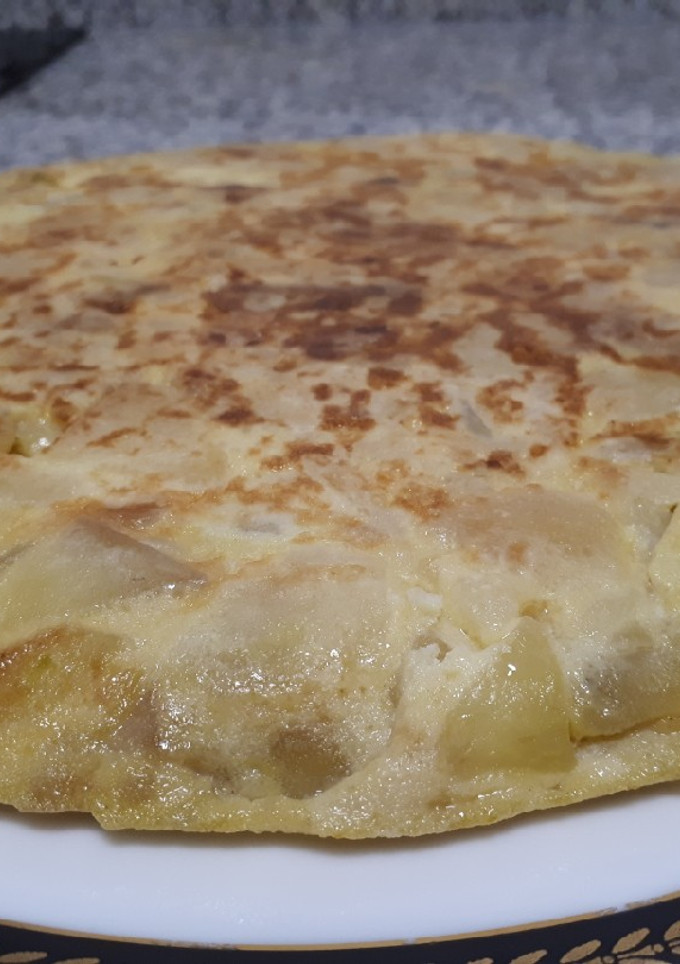 Una foto de Tortilla de patatas y calabacín