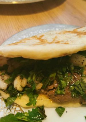 A picture of Kebab with Flatbread.