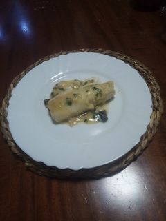 Una foto de Merluza en salsa verde