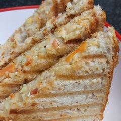 A picture of Veggie cheese mayo sandwich.