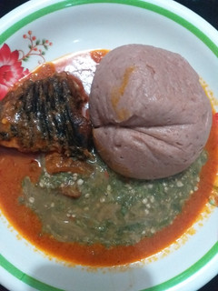 A picture of Red corn swallow with okra and fish stew.