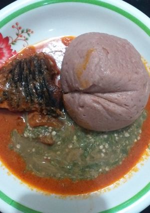 A picture of Red corn swallow with okra and fish stew.