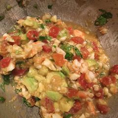 A picture of Shrimp ceviche and avocado tacos or dip.