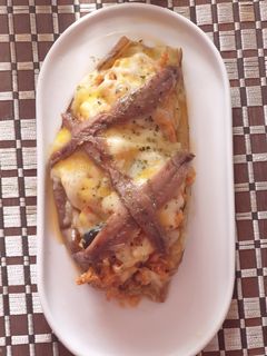 Una foto de Berenjena rellenas de atún con quesos y roquefort
