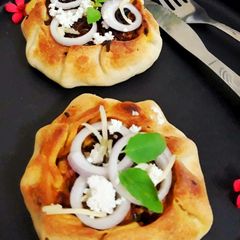 A picture of Paneer and potato stuffed galette.