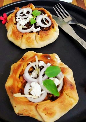 A picture of Paneer and potato stuffed galette.
