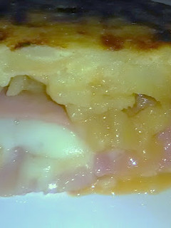 Foto principal de Tortilla de patatas rellena de jamón york y queso