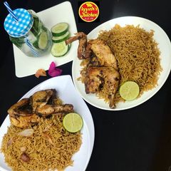 A picture of Mandi rice (chicken mandi).