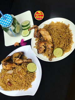 A picture of Mandi rice (chicken mandi).