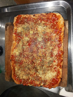 Una foto de Pizza con Royal