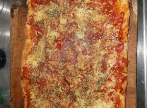Una foto de Pizza con Royal