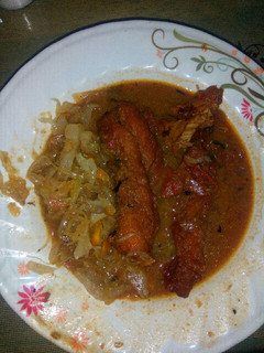 A picture of Fish fillet and cabbage With ugali.