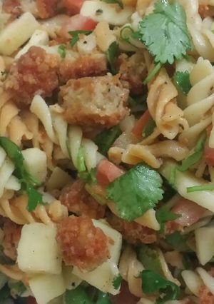 A picture of Vegan pasta salad with spicy chicken.