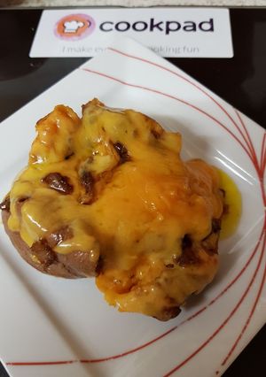 A picture of My Sweet jacket Potato & Caralmerised Onion & Cheese.😁.