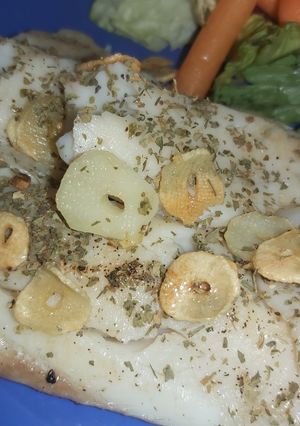 Una foto de Filete de Tilapia al ajillo
