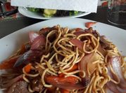 Una foto de fideo tallarín