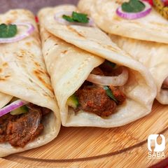 A picture of Beef Paratha Rolls ❤🌯🥒🥬🧅.