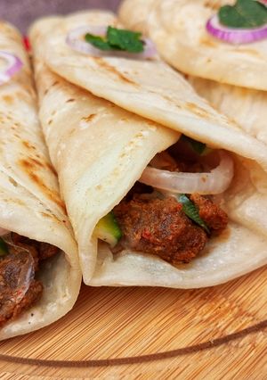 A picture of Beef Paratha Rolls ❤🌯🥒🥬🧅.