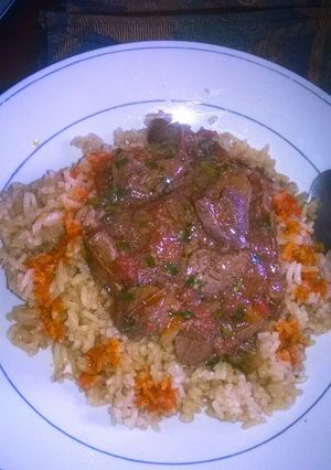A picture of Beef stew and brown rice.