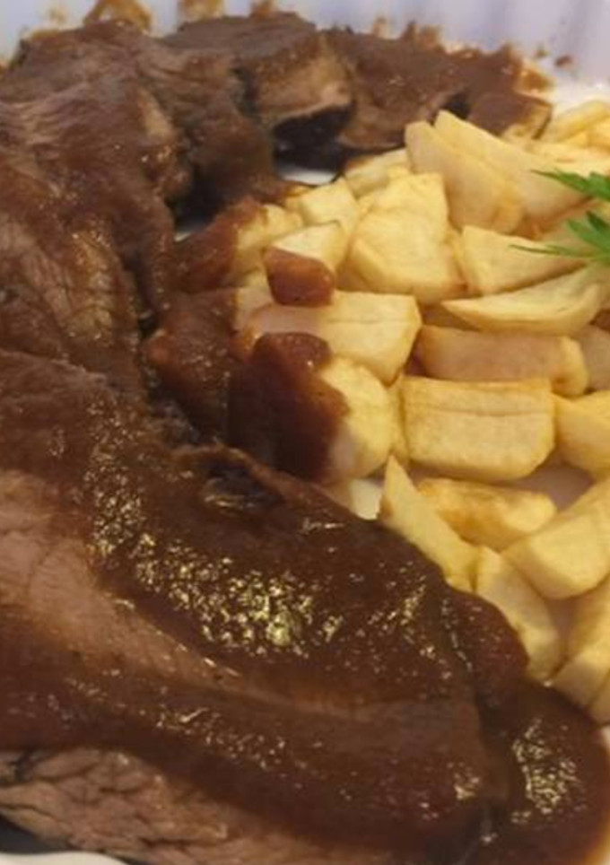 Una foto de Pez de ternera con salsa de oporto