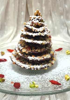 Una foto de 🌟🎄Arbolito de chocolate y frutos secos🎄🌟