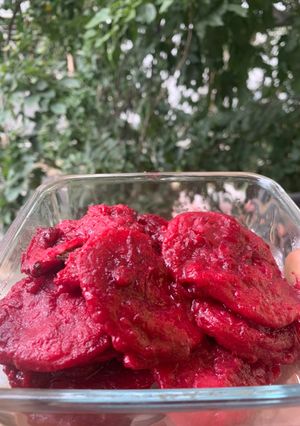 A picture of Ravioli in Beetroot sauce.