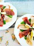 Carpaccio di pesce spada e tonno su letto di rucola