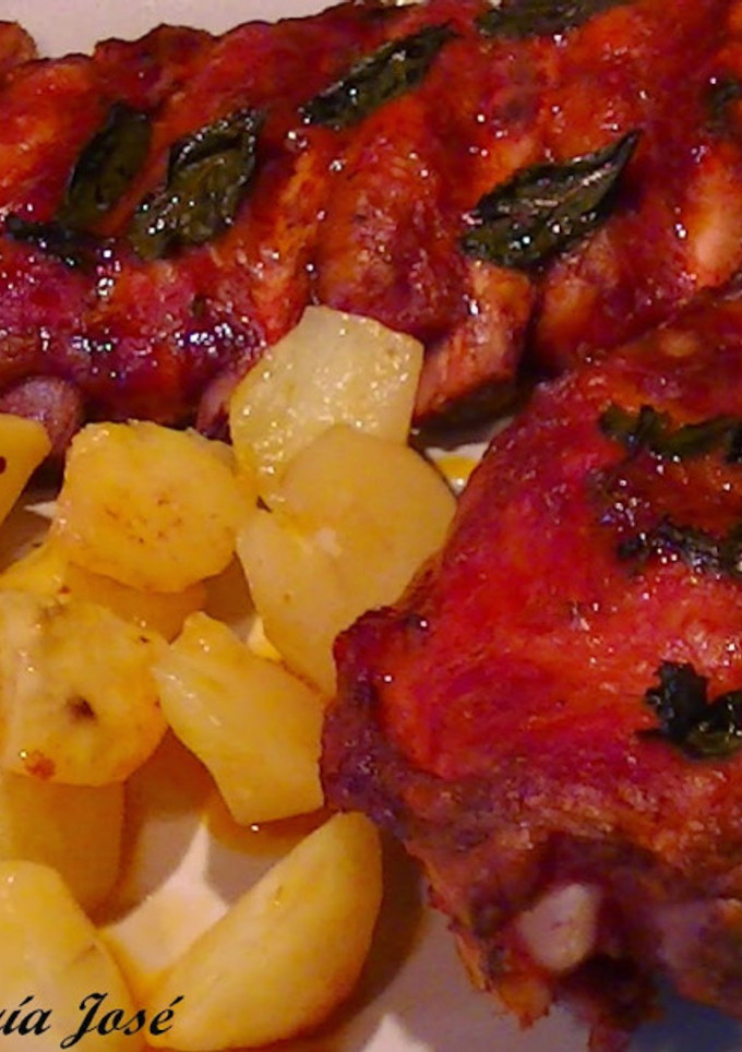 Una foto de Costilla al horno y hierbabuena
