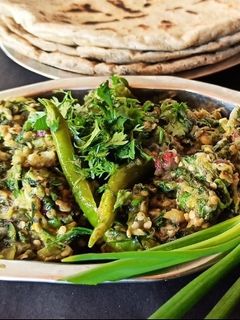 खान्देशी वांग्याचे भरीत.. (khandeshi wangyache bharit recipe in marathi) रेसिपी चे मुख्य फोटो