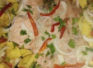 Una foto de Carne al horno con papas y verduras