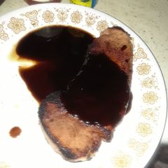 A picture of Ham Steak with Spicy Redeye Gravy.