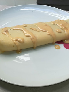 Una foto de Crepes de setas y cebolla caramelizadas con salsa de parmesano