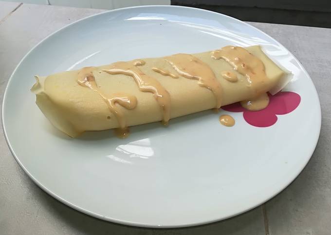 Foto principal de Crepes de setas y cebolla caramelizadas con salsa de parmesano