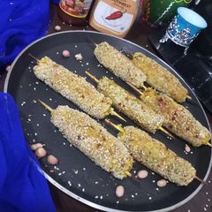 A picture of Peanut potato sesame kebab.