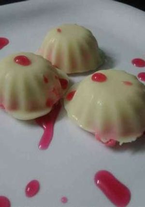 A picture of Strawberry Sandesh in White Chocolate Shells.