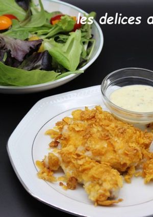 Une photo de Salade et nuggets de poulet