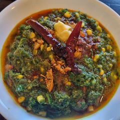 A picture of Mustard Greens with Sweet Corn.