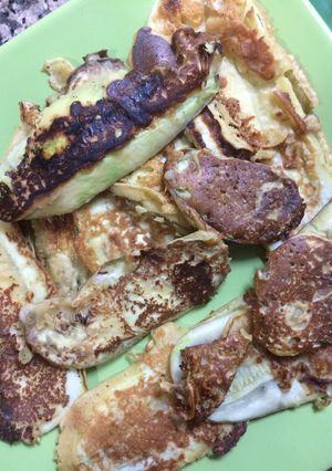 Una foto de Láminas de berenjena y zuquinis con harina de garbanzos