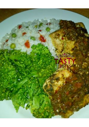 A picture of Rice with broccoli and tofu.
