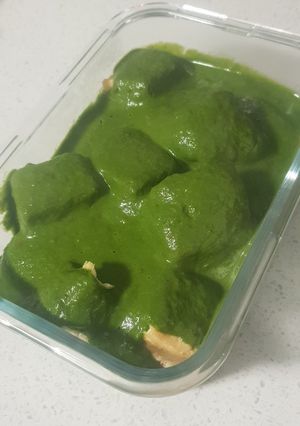 A picture of Tofu in Creamy Baby Spinach puree.