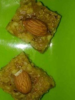 A picture of Orange Coconut Khoya Burfi.