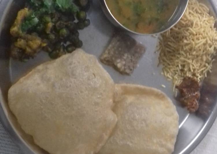 Puri,gobi matar,barfi and aloo tamatar ki sabji